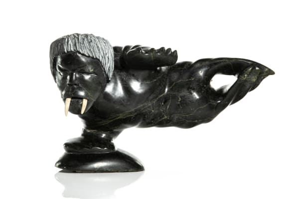 LOT 70 QUVIANATULIAK (KOV) TAKPAUNGAI (1942-) KINNGAIT (CAPE DORSET) Walrus Shaman, late 1980s stone and antler, 10.5 x 17 x 8 in (26.7 x 43.2 x 20.3 cm) ESTIMATE: $1,800 — $2,800 PRICE REALIZED: $1,680.00