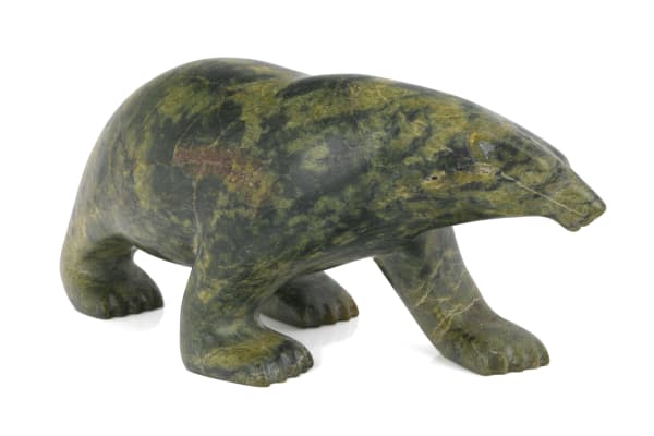 Lot 8 JOHNNY SAGIATUK (1964-) KINNGAIT (CAPE DORSET) Lumbering Polar Bear, 1996 stone, 3.5 x 9 x 4.5 in (8.9 x 22.9 x 11.4 cm) ESTIMATE: $350 — $500