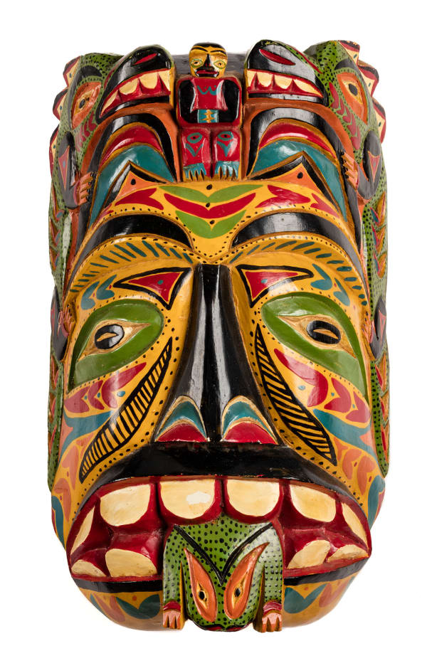 Lot 125 RAYMOND WILLIAMS, DITIDAHT/NUU-CHAH-NULTH Mask, 1956 cedar wood and acrylic paint, 12.5 x 7.5 x 3.5 in (31.8 x 19.1 x 8.9 cm) ESTIMATE: $1,000 — $1,500 PRICE REALIZED: $1,830.00