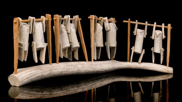 Lot 34 LUKE ANOWTALIK (1932-2006) ARVIAT (ESKIMO POINT) Acrobats, early 1990s antler, wood, and waxed string, 5.5 x 19 x 5.5 in (14 x 48.3 x 14 cm) ESTIMATE: $800 — $1,200 PRICE REALIZED: $1,680.00