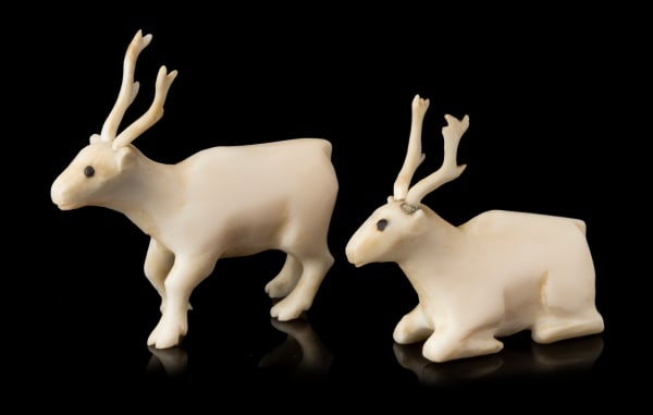 Lot 143 UNIDENTIFIED INUIT ARTIST, EASTERN CANADIAN ARCTIC Two Ivory Caribou, c. early 1950s each ivory and black inlay, the first: 1.25 x 0.5 x 1.75 in (3.2 x 1.3 x 4.4 cm) ESTIMATE: $500 — $800 PRICE REALIZED: $427.00