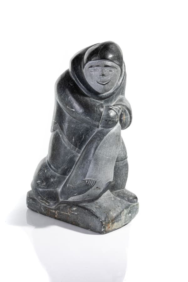 Happy Hunter with Caught Seal