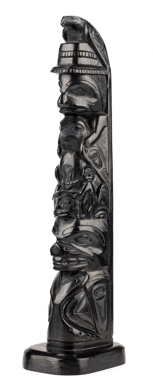 Lot 116 THOMAS MOODY (c. 1877-1947) SKIDEGATE, B.C. Model Totem Pole, 2 December 1936 argillite, 8.75 x 2 x 2.5 in (22.2 x 5.1 x 6.3 cm) ESTIMATE: $2,000 — $3,000 PRICE REALIZED: $1,920.00
