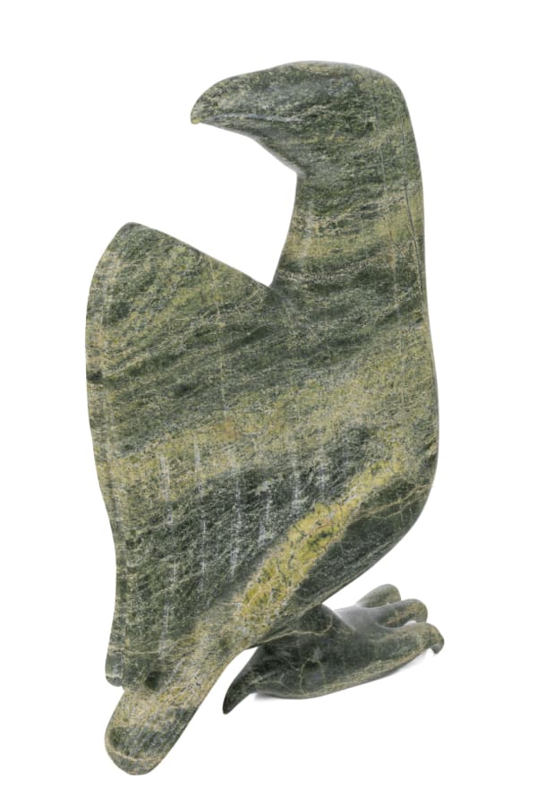 Lot 43 ARNAQU ASHEVAK (1956-2009) KINNGAIT (CAPE DORSET) Hawk Looking Back, 2000 stone, 13.75 x 9 x 3 in (34.9 x 22.9 x 7.6 cm) ESTIMATE: $800 — $1,200