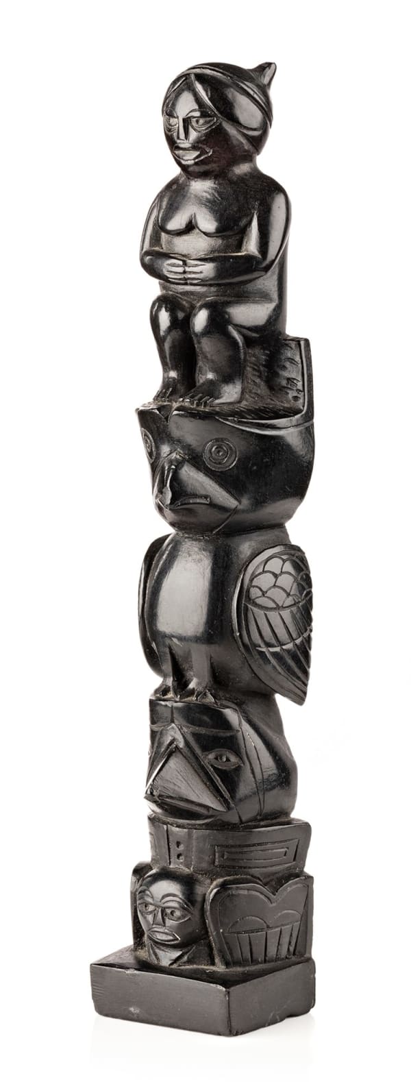 Lot 161 JOHN MARKS (IRHTEENA) (1876-1952) HAIDA Model Totem Pole, c. 1920s argillite, 7 x 1.5 x 1 in (17.8 x 3.8 x 2.5 cm) ESTIMATE: $1,500 — $2,500