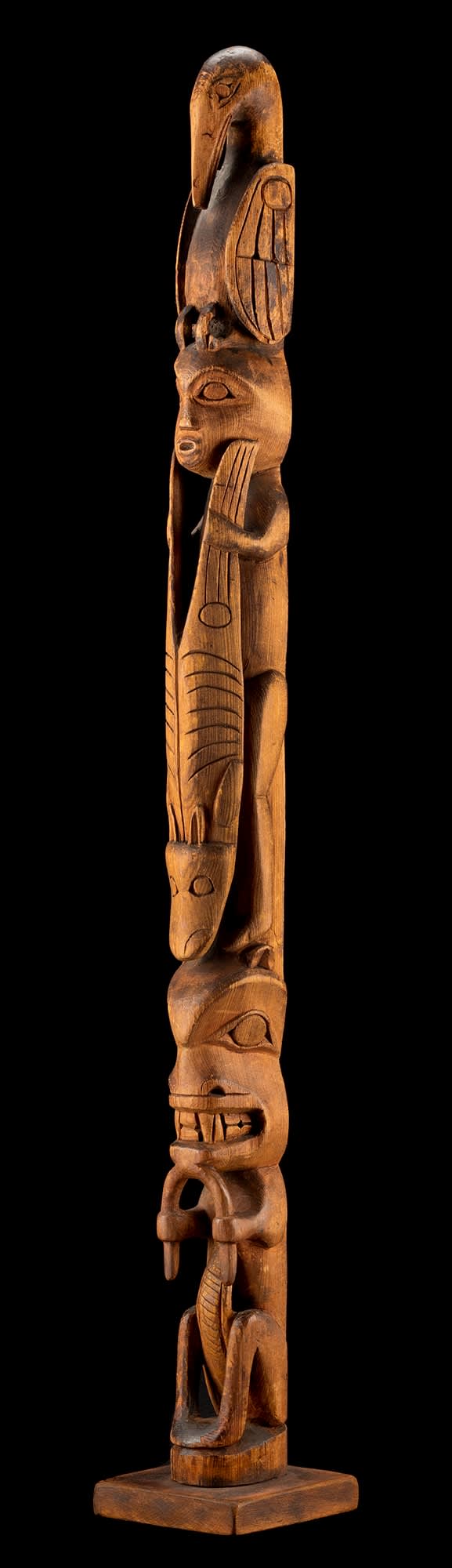 Lot 117 UNIDENTIFIED ARTIST, TLINGIT, SITKA, ALASKA Model Totem Pole, c. 1900 carved and pigmented alder, 23.25 x 3 x 3 in (59.1 x 7.6 x 7.6 cm) ESTIMATE: $4,000 — $6,000 PRICE REALIZED: $3,600.00