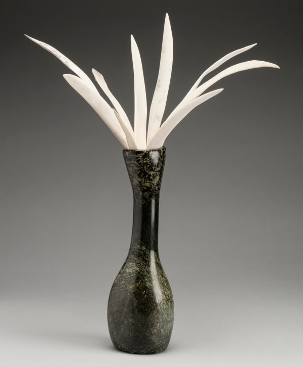 Lot 71 ARNAQU ASHEVAK (1956-2009) KINNGAIT (CAPE DORSET) Vase with Arctic Grasses, 2004 stone and antler, 16.5 x 16.5 x 12 in (41.9 x 41.9 x 30.5 cm) ESTIMATE: $5,000 — $8,000 PRICE REALIZED: $5,280.00