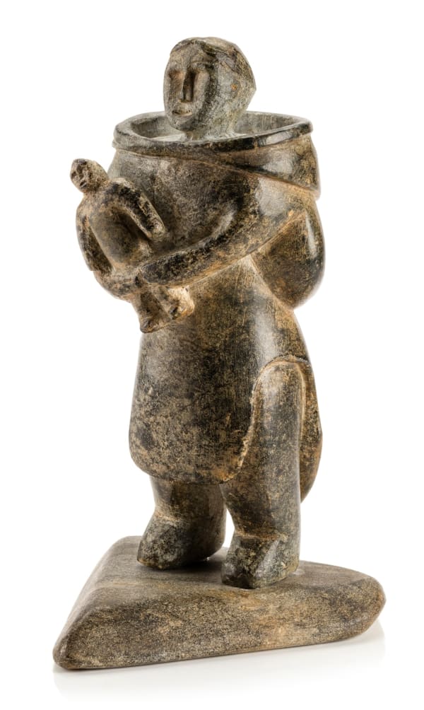 Lot 4 UNIDENTIFIED INUIT ARTIST, PROBABLY SALLUIT (SUGLUK) Mother Holding a Child, early or mid 1950s stone, 6 x 3.5 x 3.5 in (15.2 x 8.9 x 8.9 cm) ESTIMATE: $1,000 — $1,500 Price realized: $1,464.00