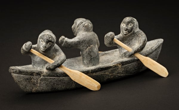Lot 9 JOE TALIRUNILI (1893-1976) PUVIRNITUQ (POVUNGNITUK) Three Hunters in a Canoe, c. 1967-68 stone and antler, 2.25 x 6.5 x 2.5 in (5.7 x 16.5 x 6.3 cm) ESTIMATE: $9,000 — $12,000 PRICE REALIZED: $13,200.00