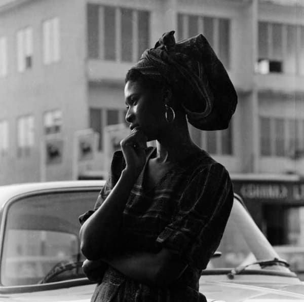 James Barnor, Margaret Obiri-Yeboah, a friend of James Barnor outside the Sick Hagemeyer store, Accra, c. 1972