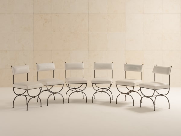 (In the style of) Gilbert Poillerat, Set of 8 chairs, c. 1950