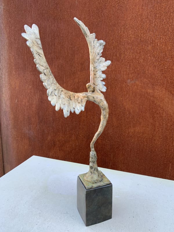 Bronze sculpture of mythical Greek winged figure Icarus by Nicola Godden, displayed on plinth