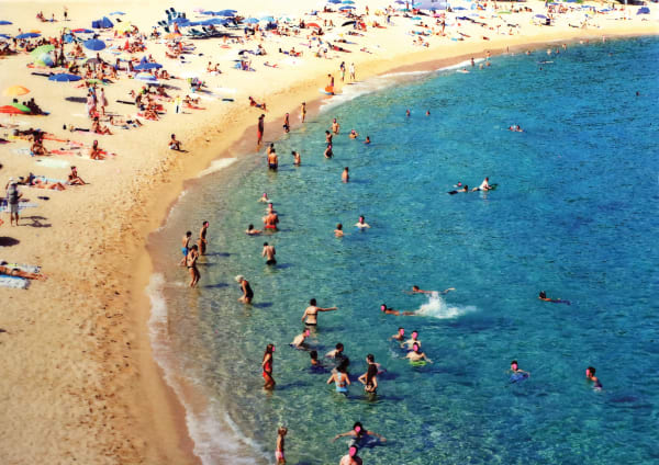 Wide angle view of people on a beach