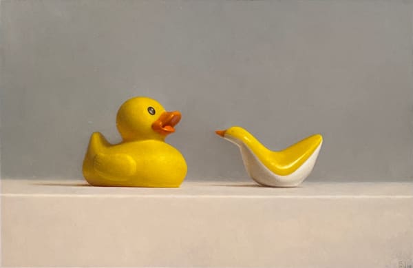 Rubber duck facing plastic minimalist duck