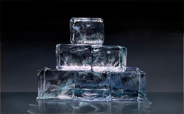 Ice cubes stacked in a pyramid with black background