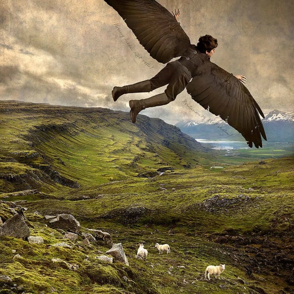Iceland photograph Tom Chambers winged boy flying over green field buy original here Gilman Contemporary Sun Valley art gallery ID