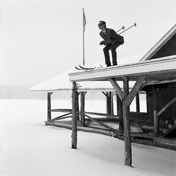 Rodney Smith photography man skiing off roof buy here Gilman Contemporary Sun Valley art gallery