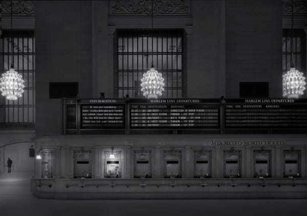 train ticket window at night grand central station by Michael massaia