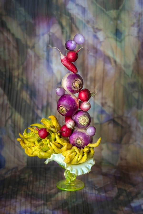 jp terlizzi whimsical photo of vegetables stacked on top of glass vase