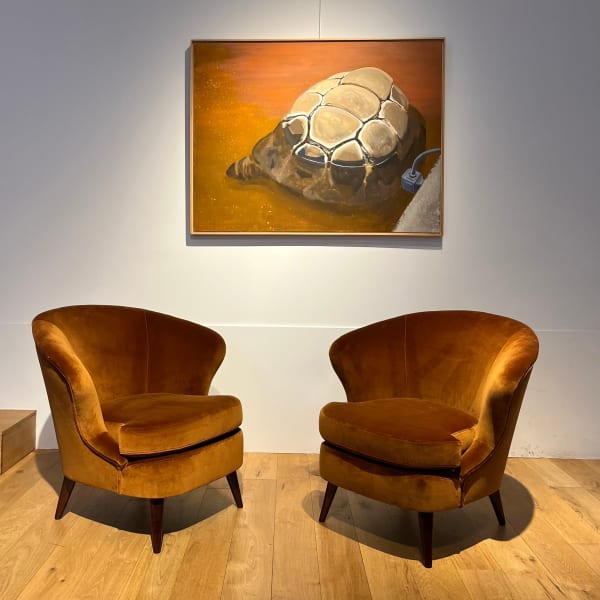 Pair of "concha" armchairs