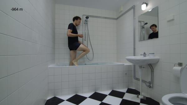 Guido van der Werve, Nummer zeventien, killing time attempt 1 from the deepest ocean to the highest mountain. (video still, screen 1), 2015