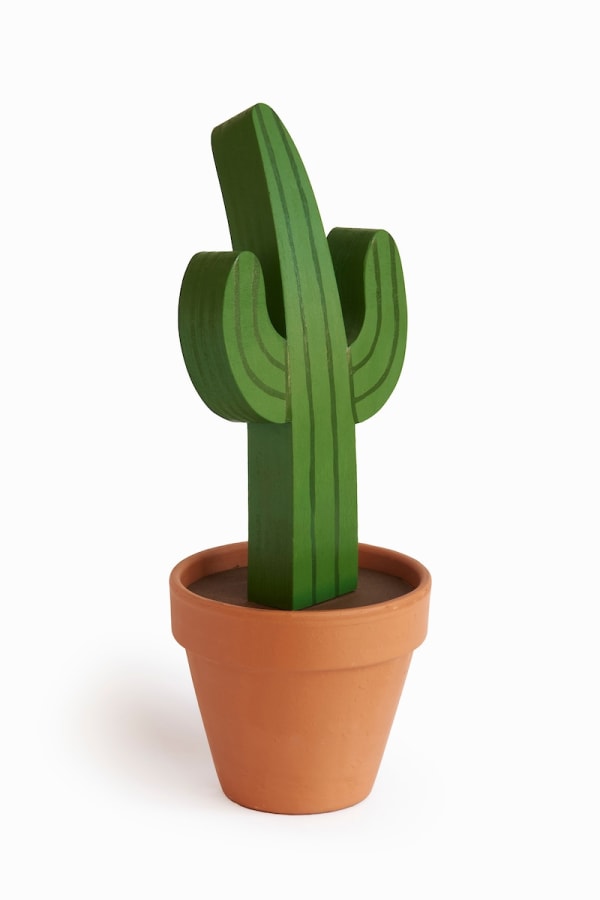 Jeff Canham wooden plant sculpture in a terra cotta pot