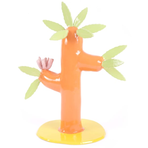ceramic sculpture of an extinct plant with an orange body and green leaves