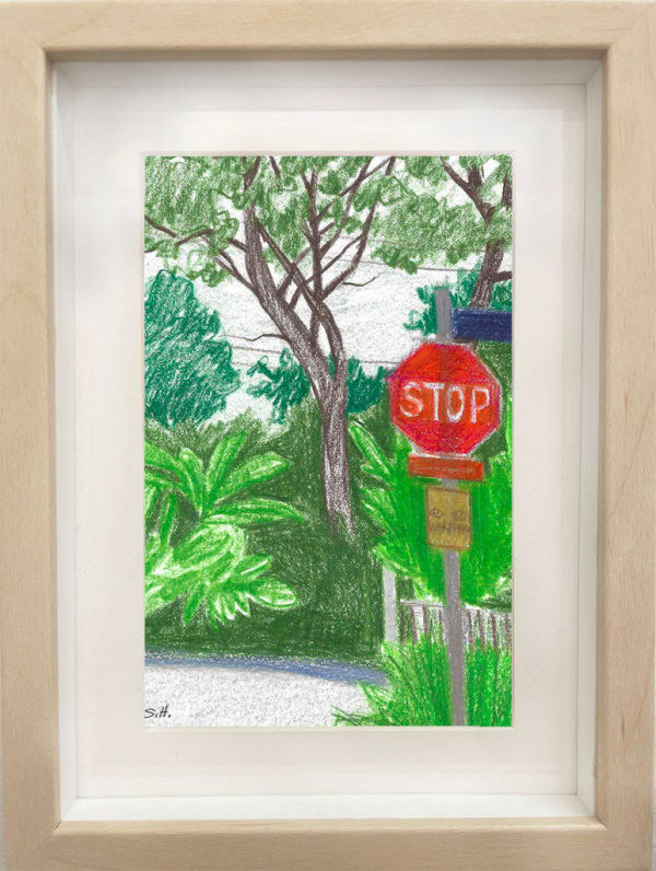 framed drawing - sketch of a stop sign surrounded by green trees and plants