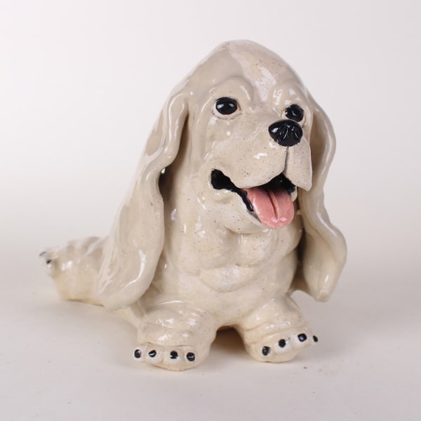 Katie Kimmel - ceramic sculpture of a white basset hound