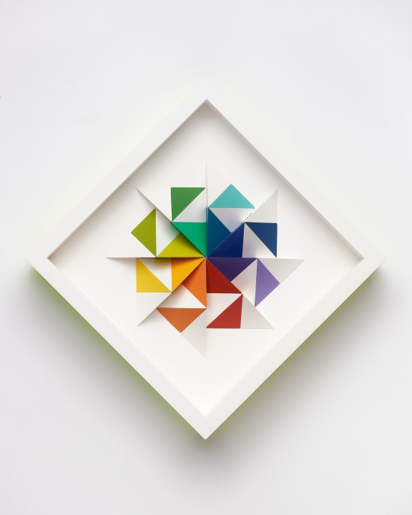 wooden geometric wall sculpture by Sean newport - rainbow