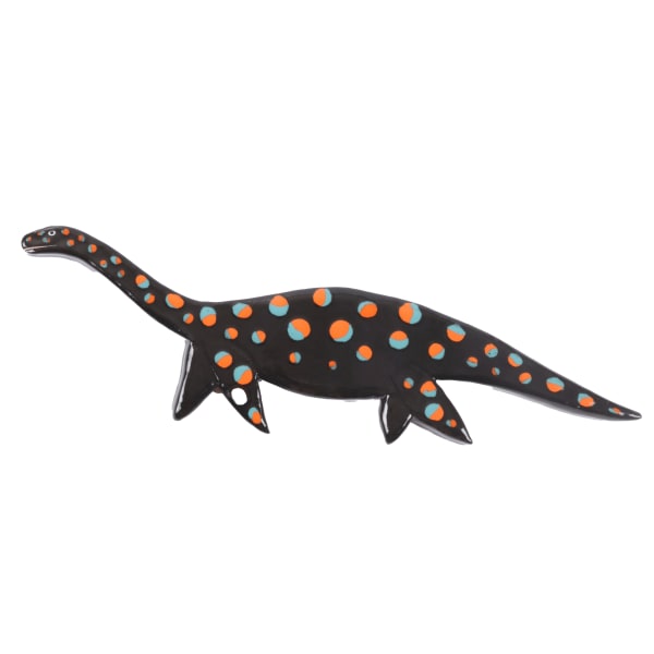 ceramic wall hanging of a black dinosaur with red and blue spots