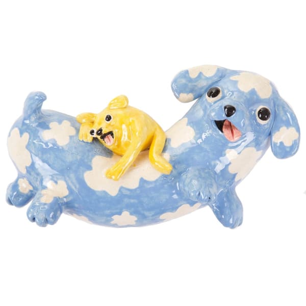 Katie Kimmel's ceramic sculpture of a blue dog with clouds and a yellow dog