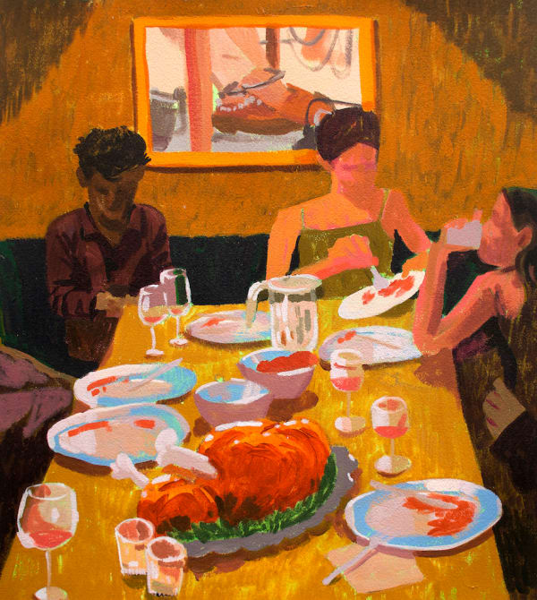 table with various foods on it with people sitting and chatting around it and a picture depicting an image of shackled ankles above them