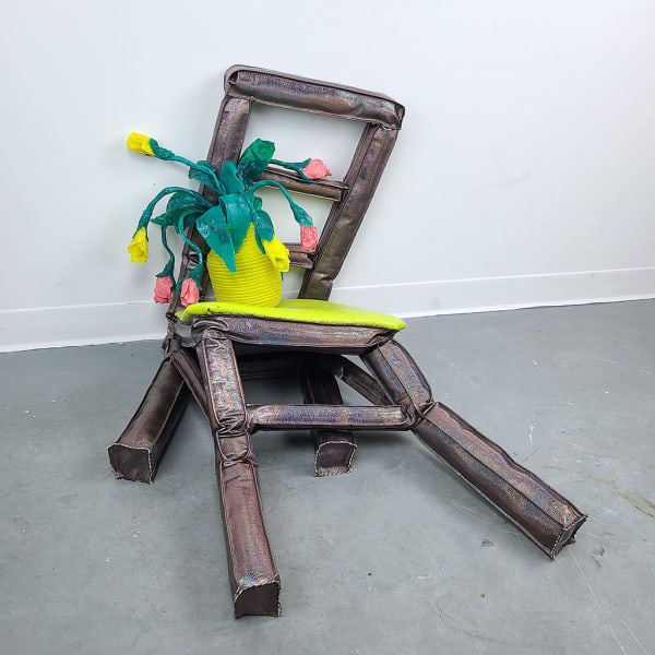 Allison Baker's sculpture of a chair with a vase on it