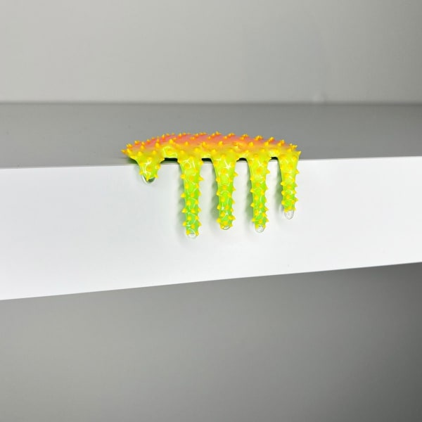 blob sculpture in yellow, orange and green