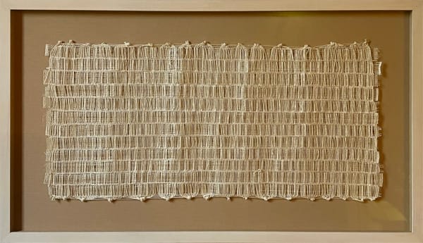 Beige woven horizontal rectangle in a frame