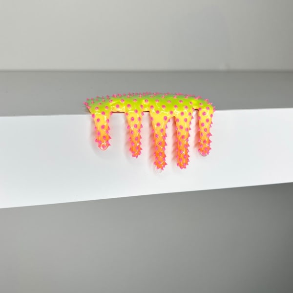 blob sculpture in yellow and orange