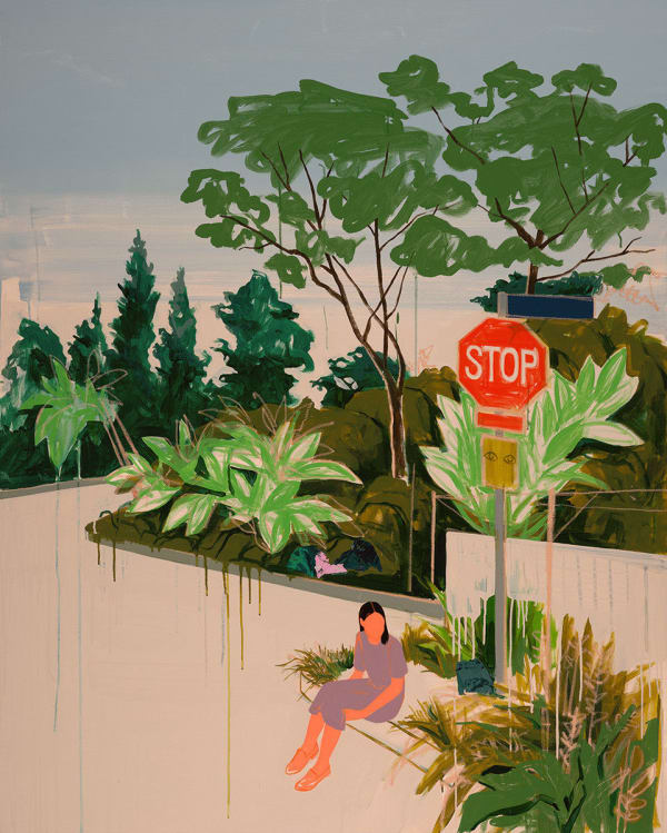 woman seated on the edge of a void with trees and plants behind her