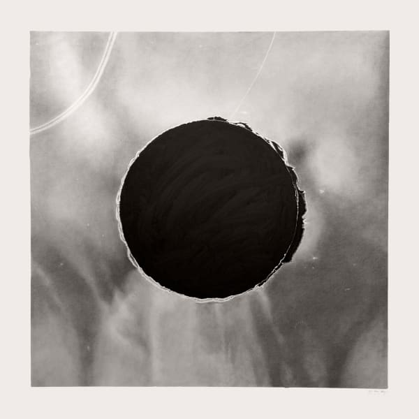 Joel Daniel Phillips graphite drawing - dark black puncture hole in center with fabric detail around