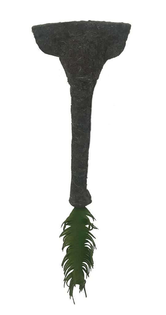 Elephant trunk made from wool and felt with a fern at the end