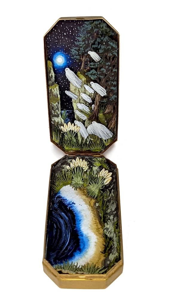 hand-cut watercolor collage in antique cosmetic compact by Shannon Taylor of a group of ghost hovering over a coast line