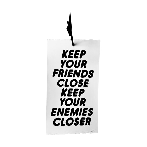 Banner sculpture with a large black arrow and text that reads: "KEEP YOUR FRIENDS CLOSE KEEP YOUR ENEMIES CLOSER" by artist Christopher Martin
