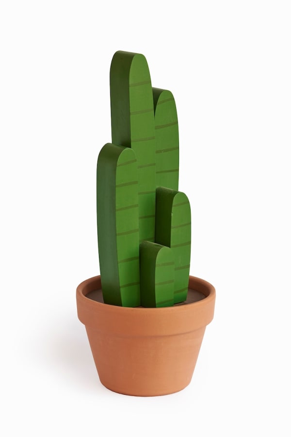 Jeff Canham wooden plant sculpture in a terra cotta pot