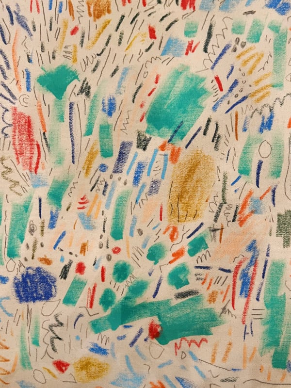 Kelly Knaga abstract drawing of flowers in green, yellow blue and reds on raw canvas