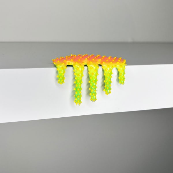 blob sculpture in yellow and green