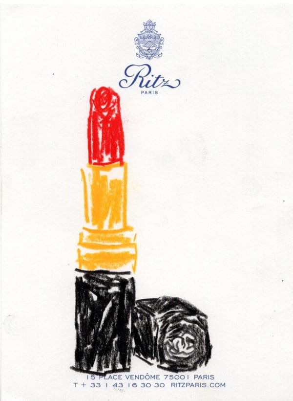 Drawing of red lipstick with the cap off next to it on hotel stationery