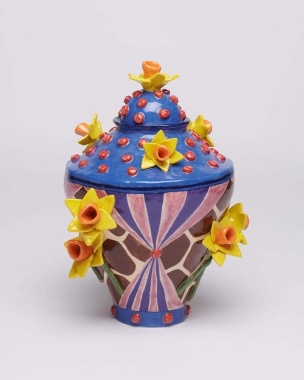 Amber Jean Young - ceramic sculpture of a abstract shape pattern vase and red dots on blue lid with yellow flowers.