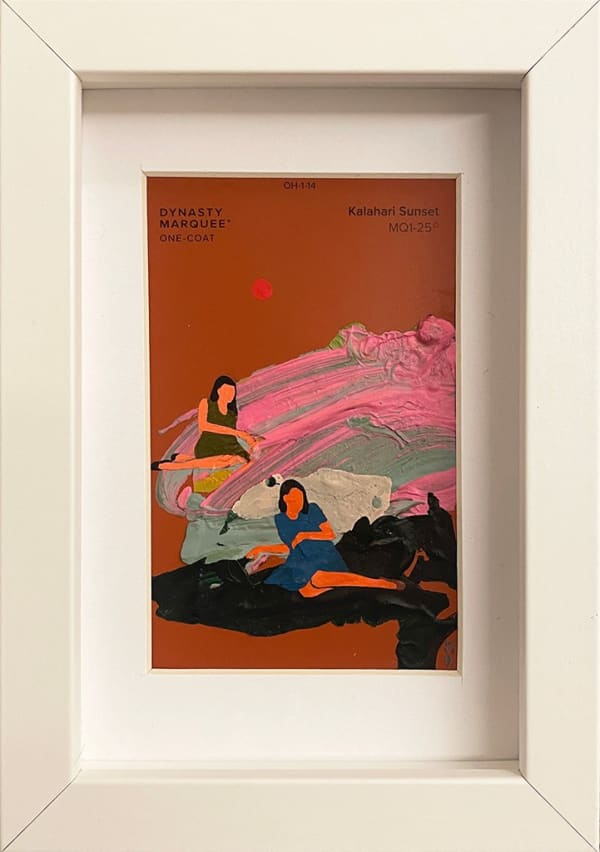 Painting on a cream paint chip of a woman in a dress laying on her back in white frame