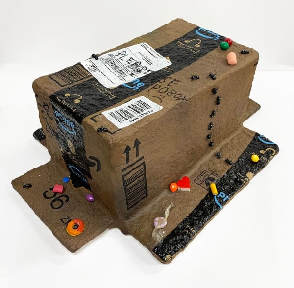 Nic Dyer mixed media sculpture of open face down Amazon box, ants and candy on outside