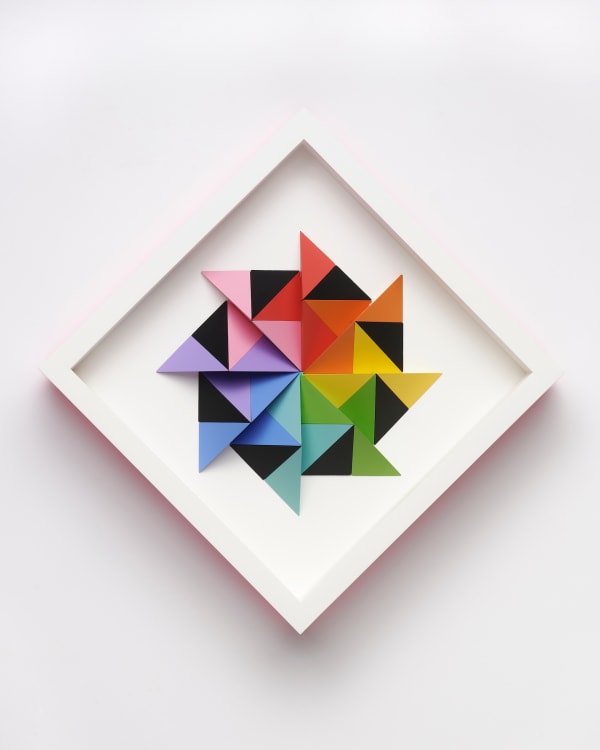 wooden geometric wall sculpture by Sean newport - rainbow